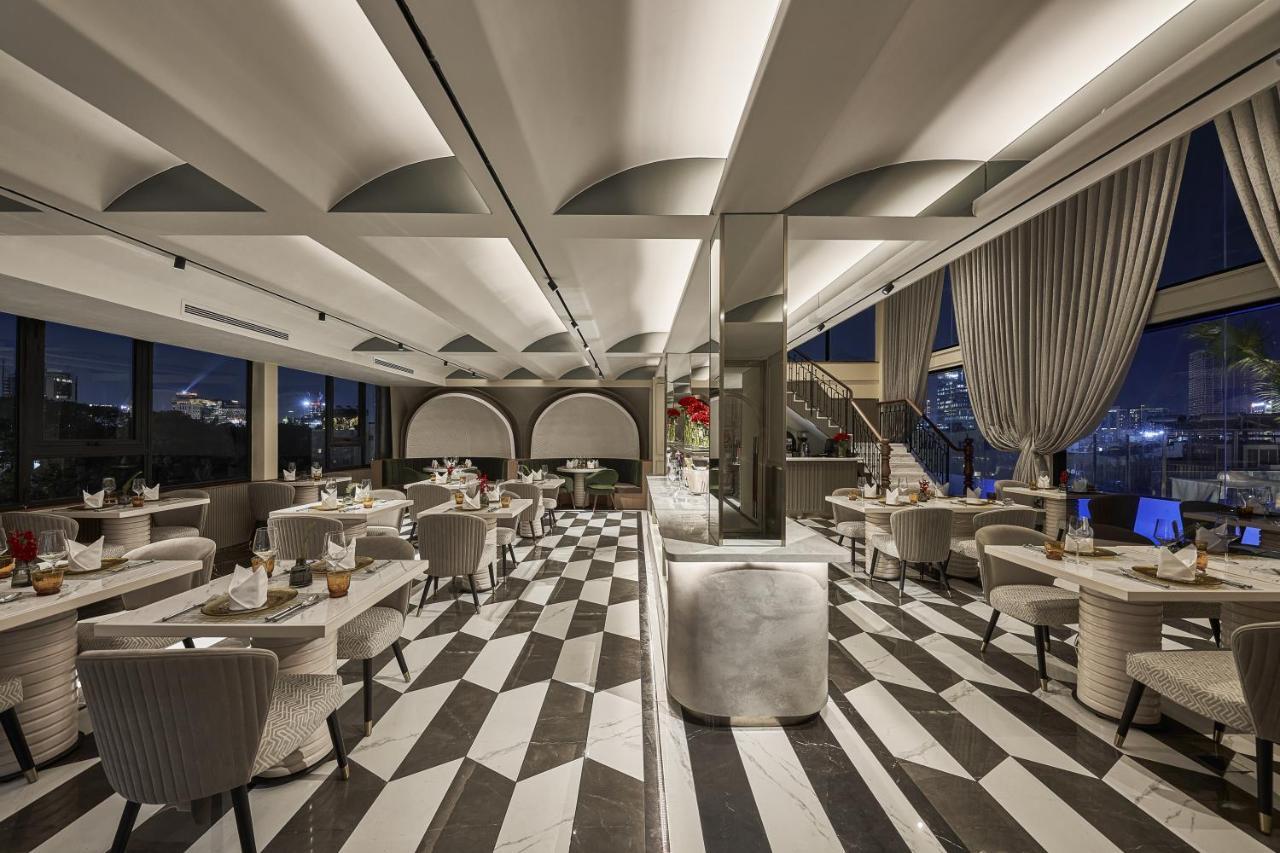 La Siesta Premium Saigon Hotel Ho Chi Minh-Byen Eksteriør billede The interior of the restaurant