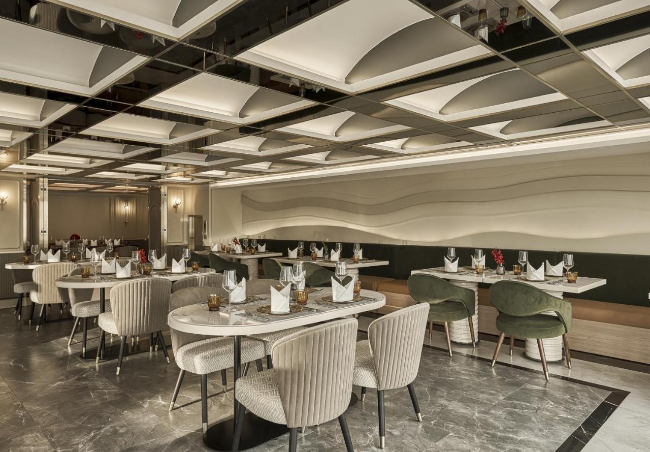 La Siesta Premium Saigon Hotel Ho Chi Minh-Byen Eksteriør billede The interior of the restaurant
