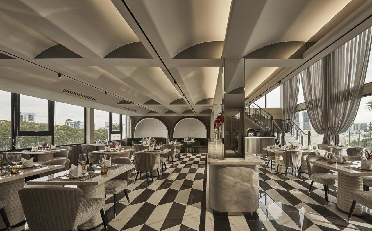La Siesta Premium Saigon Hotel Ho Chi Minh-Byen Eksteriør billede The interior of the restaurant